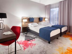Postel nebo postele na pokoji v ubytování Hotel Sadova