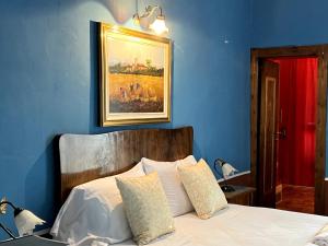Postel nebo postele na pokoji v ubytování Sangemini Home