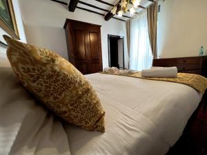 Postel nebo postele na pokoji v ubytování Sangemini Home