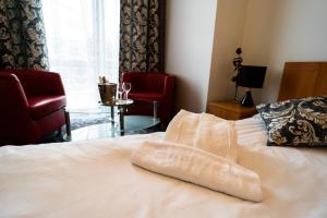 Łóżko lub łóżka w pokoju w obiekcie Hotel SANVIT RESTAURACJA & SPA