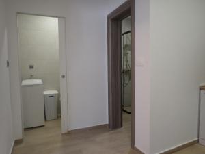 Koupelna v ubytování Apartmani NIL