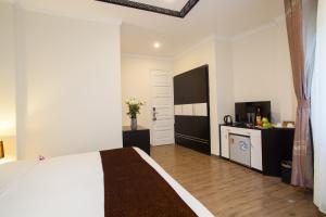 Η κουζίνα ή μικρή κουζίνα στο Serenity Diamond Hotel