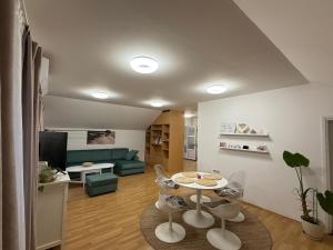 TV a/nebo společenská místnost v ubytování Apartman Magnolia