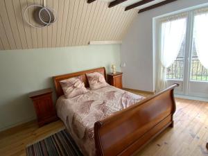 Postel nebo postele na pokoji v ubytování Maison de Montagne Soussens