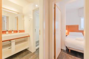 A bed or beds in a room at Stay U-nique Apartments Eslava
