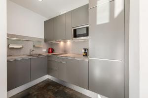 A kitchen or kitchenette at Stay U-nique Apartments Eslava