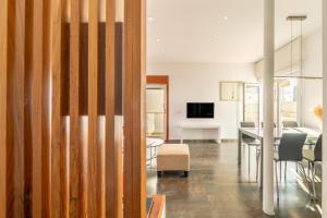A television and/or entertainment centre at Stay U-nique Apartments Eslava