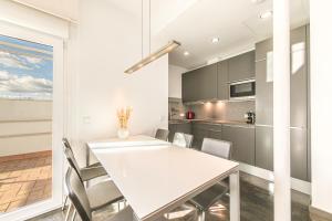 A kitchen or kitchenette at Stay U-nique Apartments Eslava