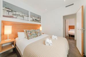 A bed or beds in a room at Stay U-nique Apartments Eslava