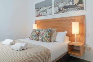 A bed or beds in a room at Stay U-nique Apartments Eslava
