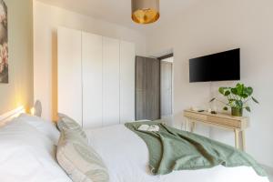 Postel nebo postele na pokoji v ubytování Attico180 - Attico in centro con Terrazza - Wifi e Netflix