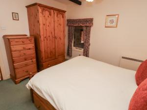 Postel nebo postele na pokoji v ubytování Lupin Cottage + 37 fotografií