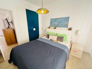 Postel nebo postele na pokoji v ubytování Bungalow Aloe Dunas 2