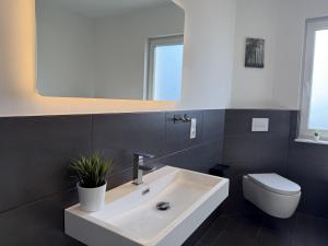 Koupelna v ubytování Heide-Liebe Appartment