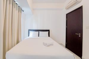 Postel nebo postele na pokoji v ubytování Best Modern 2BR at Casa de Parco Apartment By Travelio