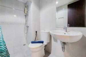 Koupelna v ubytování Best Modern 2BR at Casa de Parco Apartment By Travelio + 13 fotografií