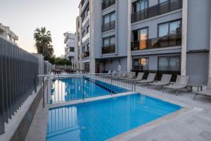 a swimming pool in the middle of a building at Peramis Hotel & Spa in Antalya