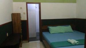 Letto o letti in una camera di ADA Homestay