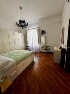 Posteľ alebo postele v izbe v ubytovaní Appartamento "Roma 148"
