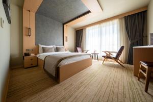 Postel nebo postele na pokoji v ubytování Avec Hotel + 37 fotografií