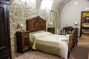 Postel nebo postele na pokoji v ubytování Castel di Pietra
