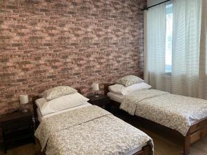 Posteľ alebo postele v izbe v ubytovaní Žižkov Cosy Studio Apartments
