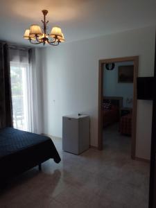 Postel nebo postele na pokoji v ubytování Boutique Algarrobo