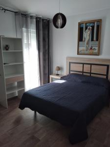 Postel nebo postele na pokoji v ubytování Boutique Algarrobo