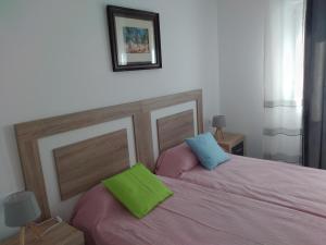 Postel nebo postele na pokoji v ubytování Boutique Algarrobo