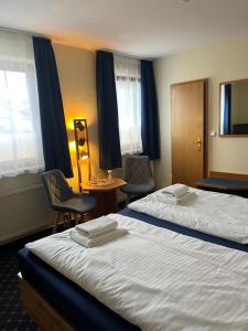 Postel nebo postele na pokoji v ubytování Pension Richter