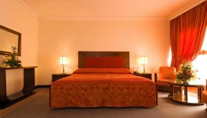 Postel nebo postele na pokoji v ubytování Hôtel Le Semiramis Marrakech by Bravia Hotels