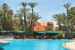 Bazén v ubytování Hôtel Le Semiramis Marrakech by Bravia Hotels nebo v jeho okolí
