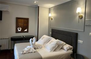 Posteľ alebo postele v izbe v ubytovaní Posada Spa San Marcos