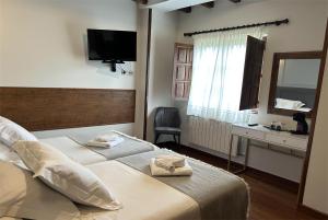 Posteľ alebo postele v izbe v ubytovaní Posada Spa San Marcos