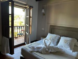 Posteľ alebo postele v izbe v ubytovaní Posada Spa San Marcos