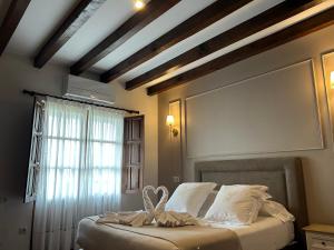 Posteľ alebo postele v izbe v ubytovaní Posada Spa San Marcos