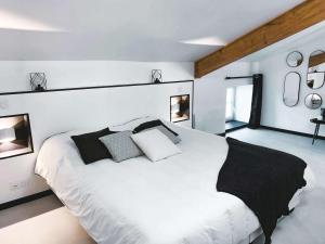 Postel nebo postele na pokoji v ubytování Le Logis de la Gabirotte