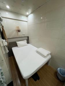Et bad på Kowloon Hostel