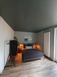 Un pat sau paturi într-o cameră la DesignApartments an der Nordsee - Wilhelmshaven - FeWo Aleksandra