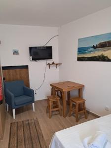 TV a/nebo společenská místnost v ubytování Casa Dorita