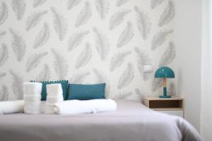 Postel nebo postele na pokoji v ubytování Residenze Miao