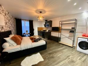 Nhà bếp/bếp nhỏ tại Escapade Détente avec Balnéo -043