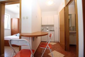 Kuchyňa alebo kuchynka v ubytovaní Apartment Djikic