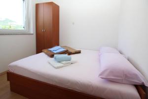 Posteľ alebo postele v izbe v ubytovaní Apartment Djikic