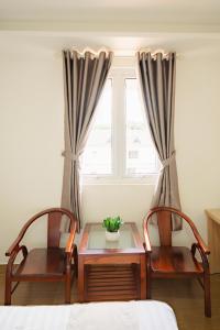 Χώρος καθιστικού στο Ngoc Nguyen Anh Hotel Da Lat