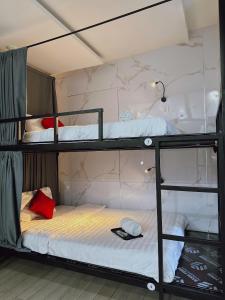 Postel nebo postele na pokoji v ubytování My Suites Da Nang Bed and Bath