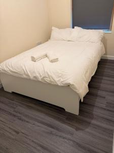 Ένα ή περισσότερα κρεβάτια σε δωμάτιο στο Apartment !STO