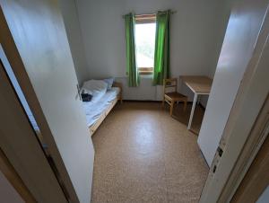 En eller flere senge i et værelse på Givas