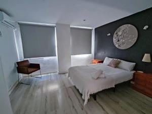 A bed or beds in a room at Townhouse with bbq and pools - Costa Hispania Még 37 kép