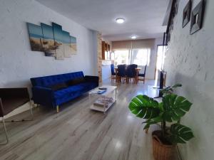 A seating area at Townhouse with bbq and pools - Costa Hispania